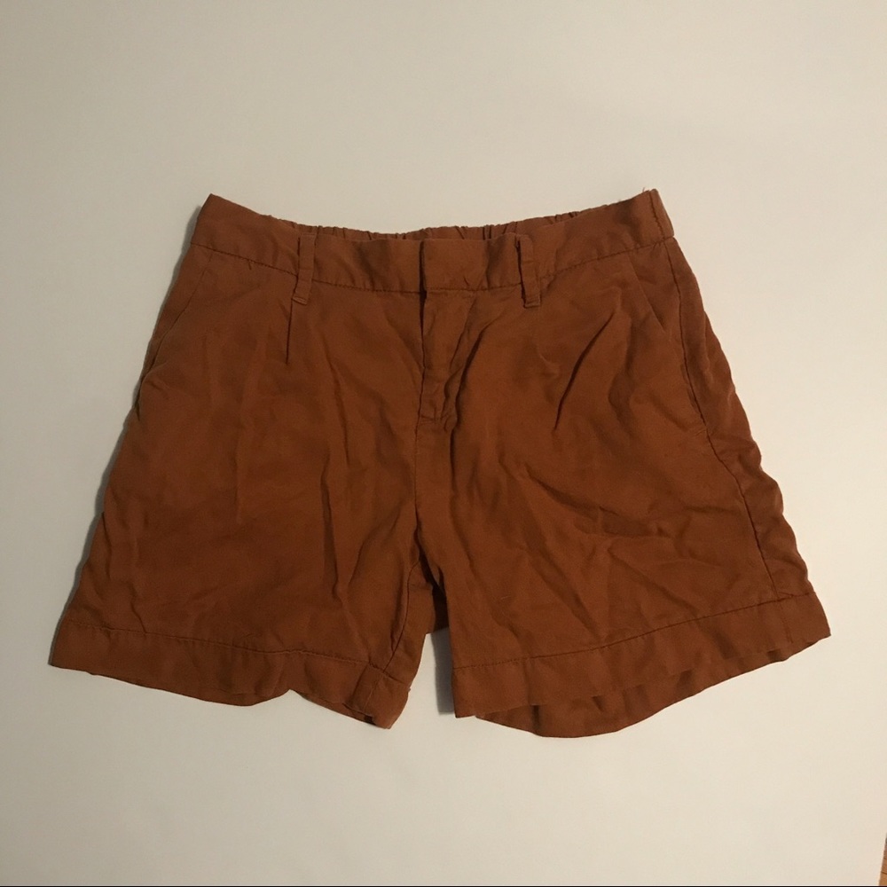 Rust colored midi shorts, size Small.